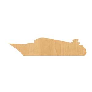 May include: A flat, light brown wooden cutout in the shape of a cruise ship. The silhouette features a pointed bow, a multi-tiered superstructure, and a distinct stern section, showcasing the natural grain and texture of the wood material.