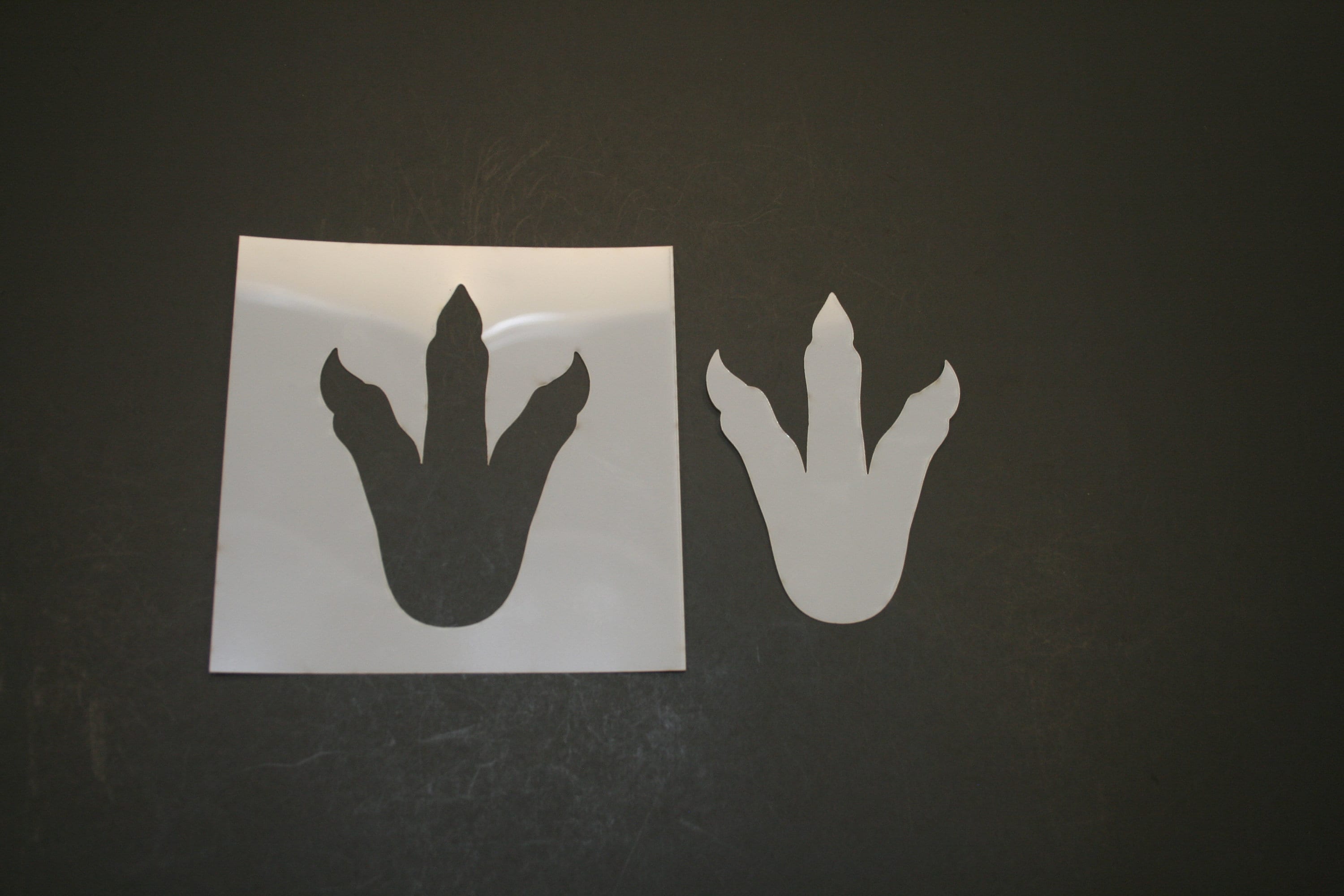 Dinosaur Foot Print Reusable Mylar Stencil Art Supplies Etsy dinosaur-foot-print-reusable-mylar-stencil-art-supplies-etsy