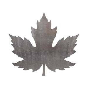 May include: A silver metal maple leaf with a textured surface.