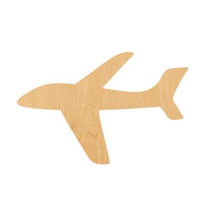 May include: A flat, two-dimensional cutout of an airplane silhouette crafted from light-colored wood. The object features a smooth, natural grain texture and a simple, recognizable shape with a pointed nose, two wings, and a tail section.