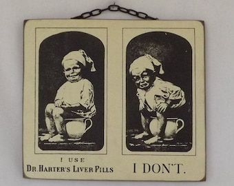 Dr. Harter's Liver Pills Advertisement on Hanging Wooden Wall Sign