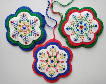 Set of Green, Red, and Blue Embroidered Scandinavian Folk Art Snowflake Ornaments Embellished with Beads and Sequins