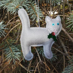 Gray merino wool felt cat ornament with hand embroidered face