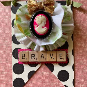 Brave cameo hanging door sign