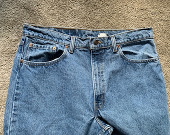 Vintage 90s Levis 550 Light Wash Jeans 38x30