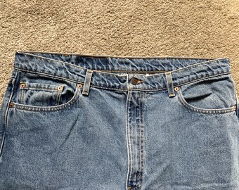 Vintage 90s Levis 550 Light Wash Jeans 42x30