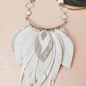 White silver bib leather feather necklace.