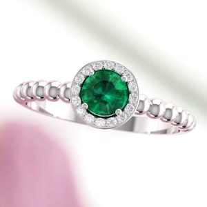 Emerald engagement ring. Emerald and diamond ring. Rose emerald ring.