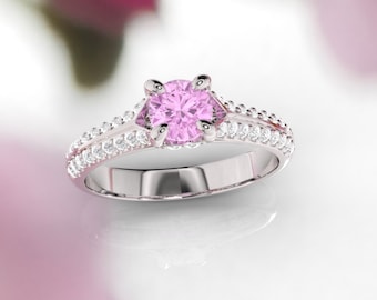 Pink sapphire and diamond ring. Engagement ring. Diamond and sapphire ring. Available in 14K, 18K yellow, white and rose gold.