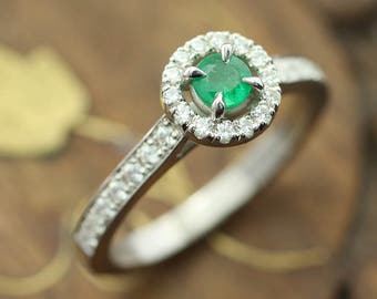 Emerald and diamond ring. Emerald engagement ring. Pave diamond ring. Diamond jewelry.