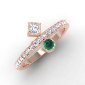 Emerald ring, emerald engagement ring. Emerald and diamond ring. Available in rose white or yellow gold or platinum.
