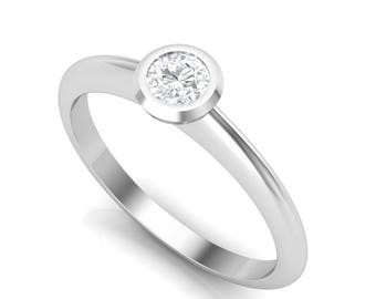 Diamond ring. Engagement ring. Platinum solitaire diamond ring. Dainty modern minimal ring.