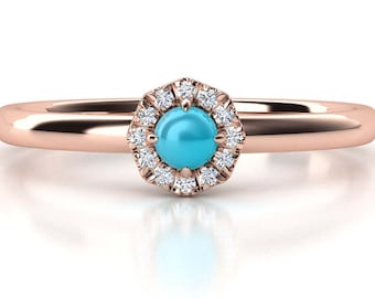 Natural turquoise and diamond ring. Available in 18K rose, white, yellow gold or platinum. Turquoise jewelry.