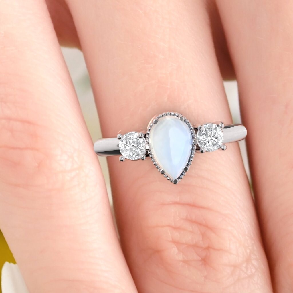 Moonstone ring. Moonstone and diamond ring. Moonstone engagement ring. Pearshape moonstone ring.  14K, 18K or platinum.