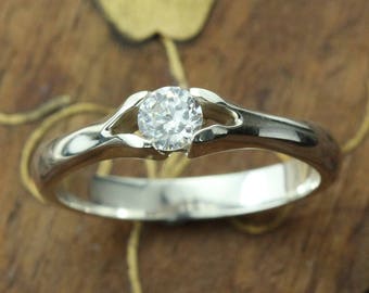 Diamond ring. Solitaire diamond engagement ring. White gold diamond ring. 18K gold ring.