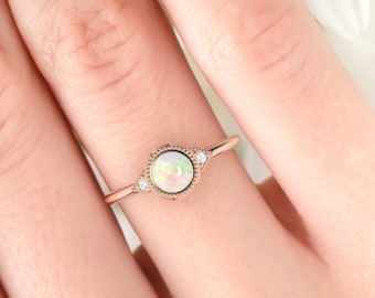 Opal ring. Opal and diamond ring. Opal engagement ring with fine millgrain detail. 14K, 18K or platinum.