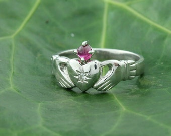 Diamond claddagh ring with minimalist ruby gemstone crown. Ruby claddagh ring.