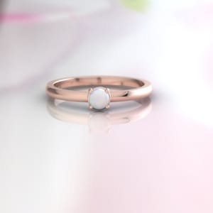 Opal ring. Opal engagement ring. Opal promise ring. Wedding ring.  Dainty modern minimalist ring.