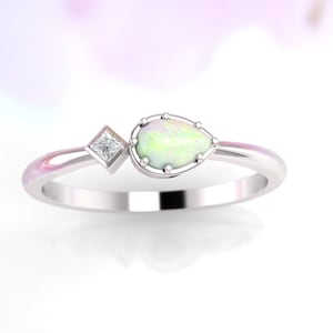 Anel de noivado em opala. Opala em formato de pêra e diamante Princesa. Anel da eternidade. Anel de noivado. 14K/18K/Platina.