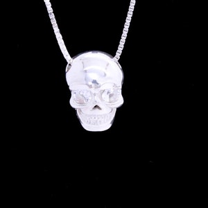 Skull necklace, sterling silver skull head necklace with 2 crystal eyes .