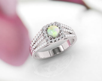 Opal ring. Engagement ring. Diamond and opal ring. Available in 14K, 18K yellow, white and rose gold also in platinum.
