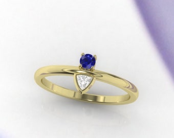 Engagement ring. Sapphire and Diamond ring. Trillion diamond ring.