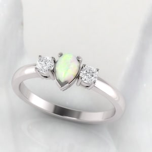 Opal and diamond engagement ring. Diamond ring. Pear shape Opal. 14K , 18K or Platinum.