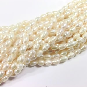 10 30 freshwater pearls cultured pearls white cream oval baroque approx: 6-7.5x5-6 mm pearls 2k image 2