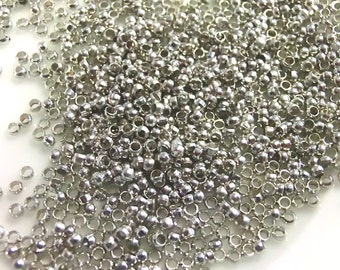 100 perles à sertir acier inoxydable chirurgical 2mm ronde à sertir #S677