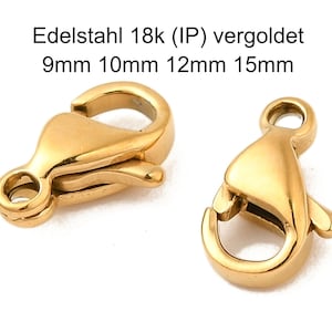 Könnte beinhalten: Zwei goldfarbene Karabinerverschlüsse aus Edelstahl. Die Verschlüsse sind in den Größen 9 mm, 10 mm, 12 mm und 15 mm erhältlich. Der Text "Edelstahl 18k (IP) vergoldet" befindet sich oberhalb der Verschlüsse.