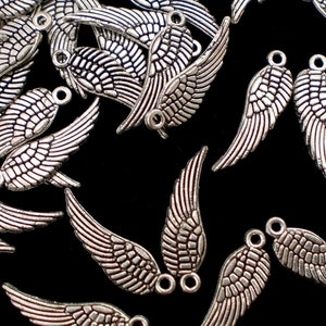 100 WINGS pendant angel wings 17 x 5 mm charms color choice silver antique silver gold and bronze angel spacer lucky charm metal Antiksilber #S582