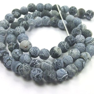 Weathering agate weathered 6/8 mm black grey matt pearls round 1 strand image 1