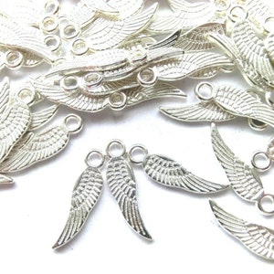 100 WINGS pendant angel wings 17 x 5 mm charms color choice silver antique silver gold and bronze angel spacer lucky charm metal Silber #S104