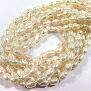 10 30 freshwater pearls cultured pearls white cream oval baroque approx: 6-7.5x5-6 mm pearls 2k image 4