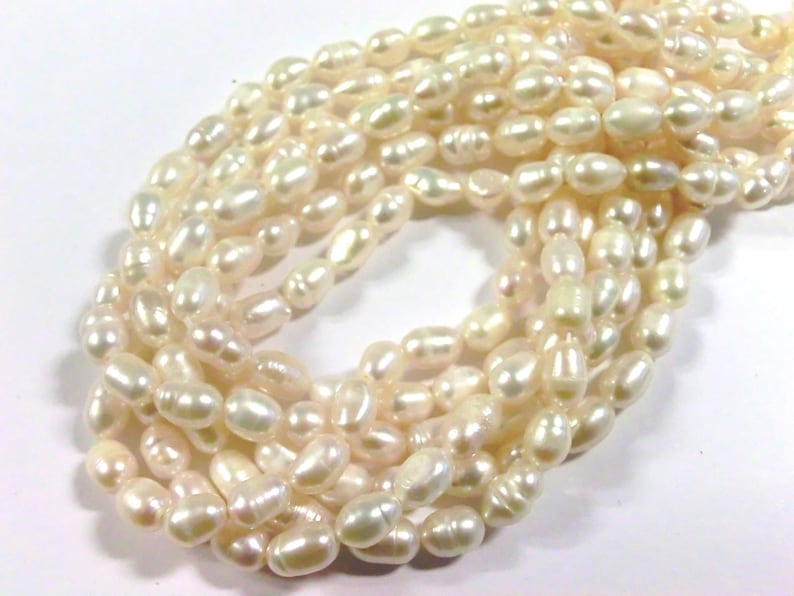 10 30 freshwater pearls cultured pearls white cream oval baroque approx: 6-7.5x5-6 mm pearls 2k image 4