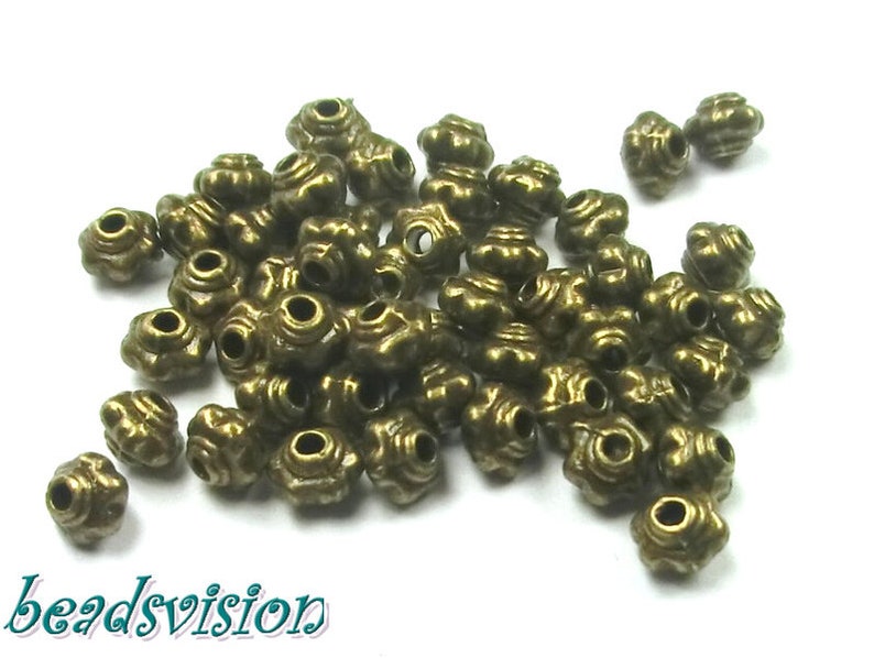 Spacer pumpkin 3 x 4 mm metal beads 100 1000 beads color bronze metal rondelle S388 image 1