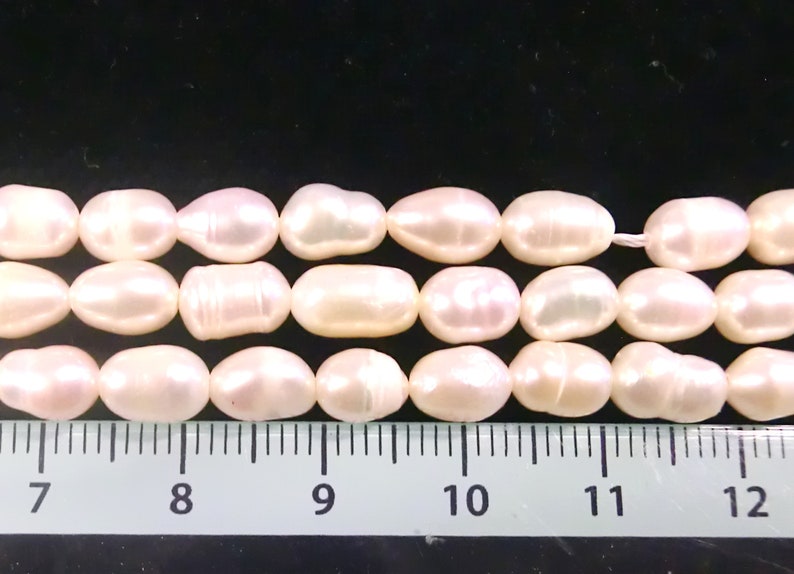 10 30 freshwater pearls cultured pearls white cream oval baroque approx: 6-7.5x5-6 mm pearls 2k image 5