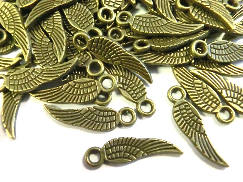 100 WINGS pendant angel wings 17 x 5 mm charms color choice silver antique silver gold and bronze angel spacer lucky charm metal Bronze #S548