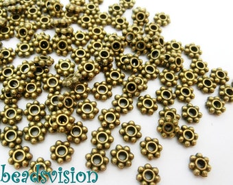 Daisy Spacer Metallperlen rund 6mm Farbe bronze antik #S268