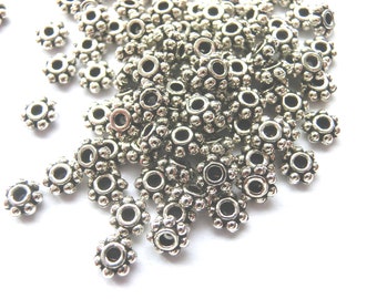 Daisy spacer 4 mm rond egaal kleur antiek zilver 100 - 1000 stuks #S142