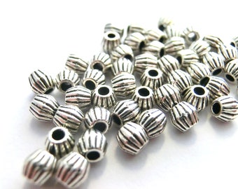 50 entretoises 4,5 x 4 mm perles métalliques couleur argent antique rondelle #S100