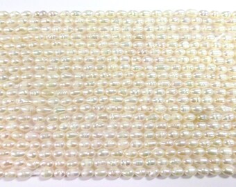 10 -30 freshwater pearls cultured pearls white cream oval baroque approx: 6-7.5x5-6 mm pearls #2k