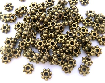 Daisy spacer metalen kralen 4 mm kleur brons antiek rond plat 100 - 1000 stuks metaal #S023