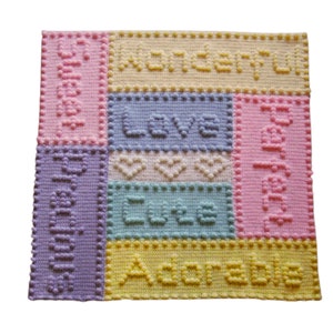 May include: A multi-coloured crocheted baby blanket with the words "Sweet Dreams", "Wonderful", "Love", "Cute", and "Adorable" in different colours.