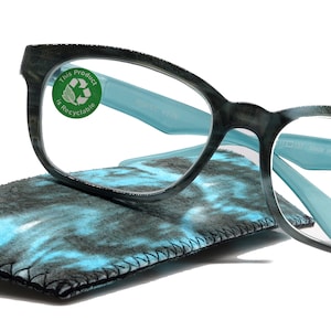 May include: Blue and black reading glasses with a +2.75 strength and a blue and black patterned case. The glasses have a sticker that says "This product is recyclable".