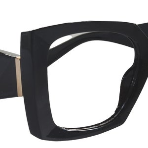 May include: Black square-shaped eyeglasses with thick frames.