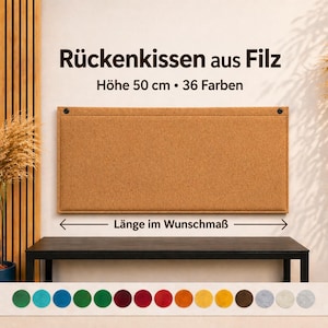 以下が含まれることがあります： 「Rückenkissen aus Filz」と「Höhe 50 cm • 36 Farben」のテキストが入った、長方形の茶色のフェルト製背もたれ。白い壁に取り付けられており、黒いテーブルの上にあります。12色のカラーパレットが表示されています。