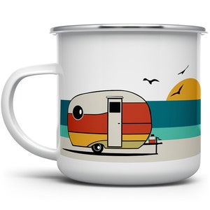 May include: White enamel camping mug with a retro illustration of a camper van on a beach with a sunset and seagulls.