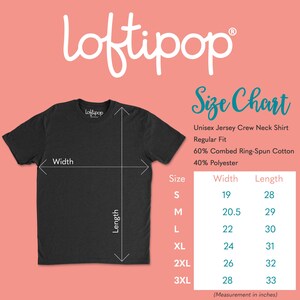 May include: Black crew neck t-shirt with a size chart. The chart details measurements for a unisex jersey shirt, including width and length in inches for sizes S to 3XL. The shirt is 60% cotton and 40% polyester.