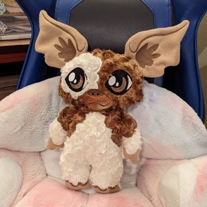 GREMLINS - Peluche Gizmo Transformable - 31cm